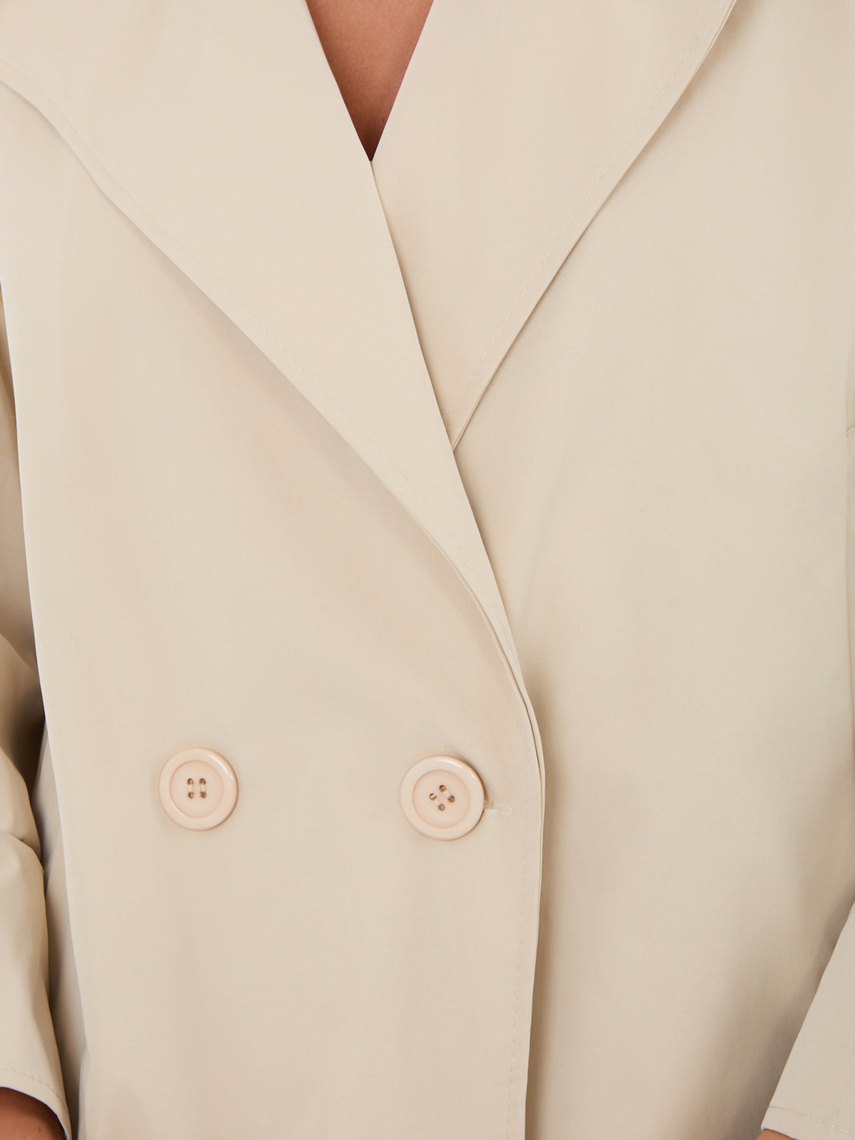 Abrigo Beige de Entretiempo con Bolsillos